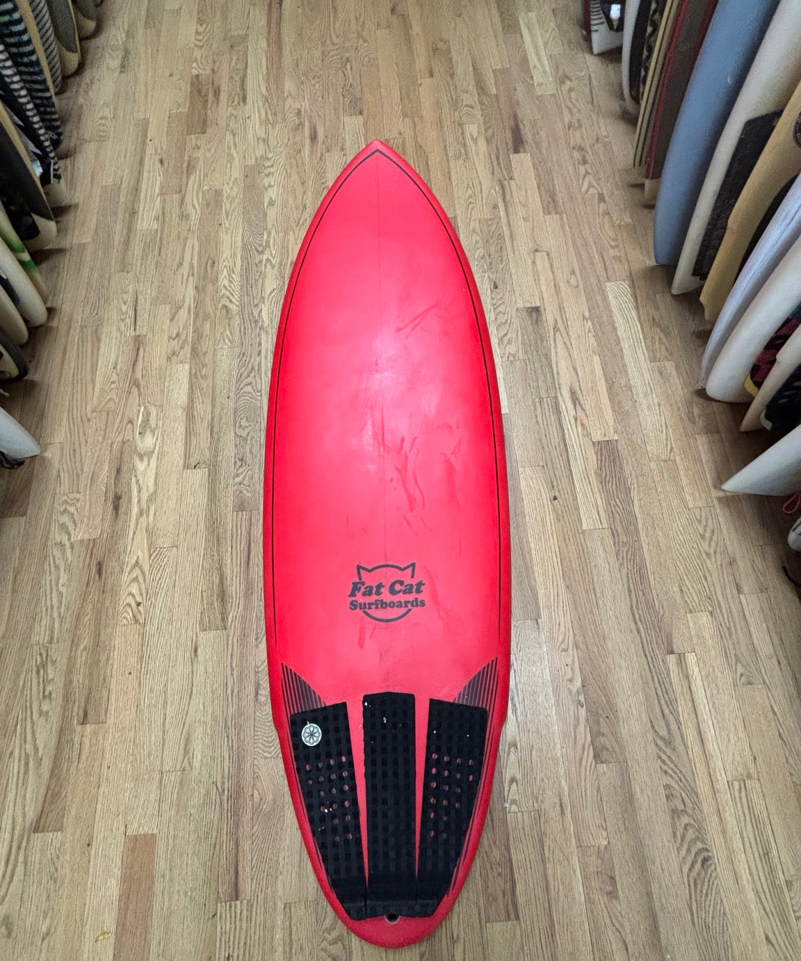 5 foot 6 red Fat Cat twin fin surfboard deck